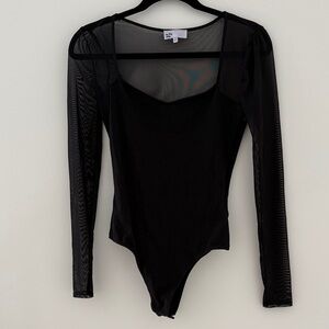 by the way. Sheer Black Long-Sleeve Bodysuit